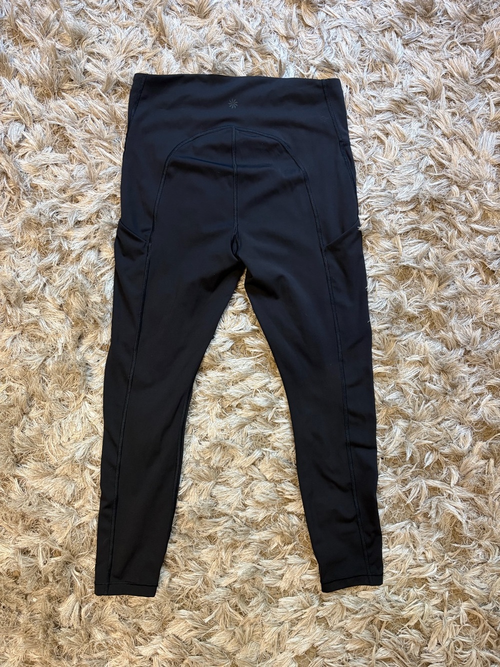 Athleta Black High-Rise Performance Leggings with Side Pockets